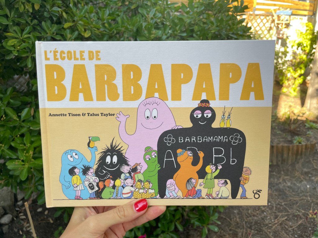 Couverture du livre 'L'école de Barbapapa' par Annette Tison et Talus Taylor, montrant des personnages colorés de Barbapapa et des enfants.